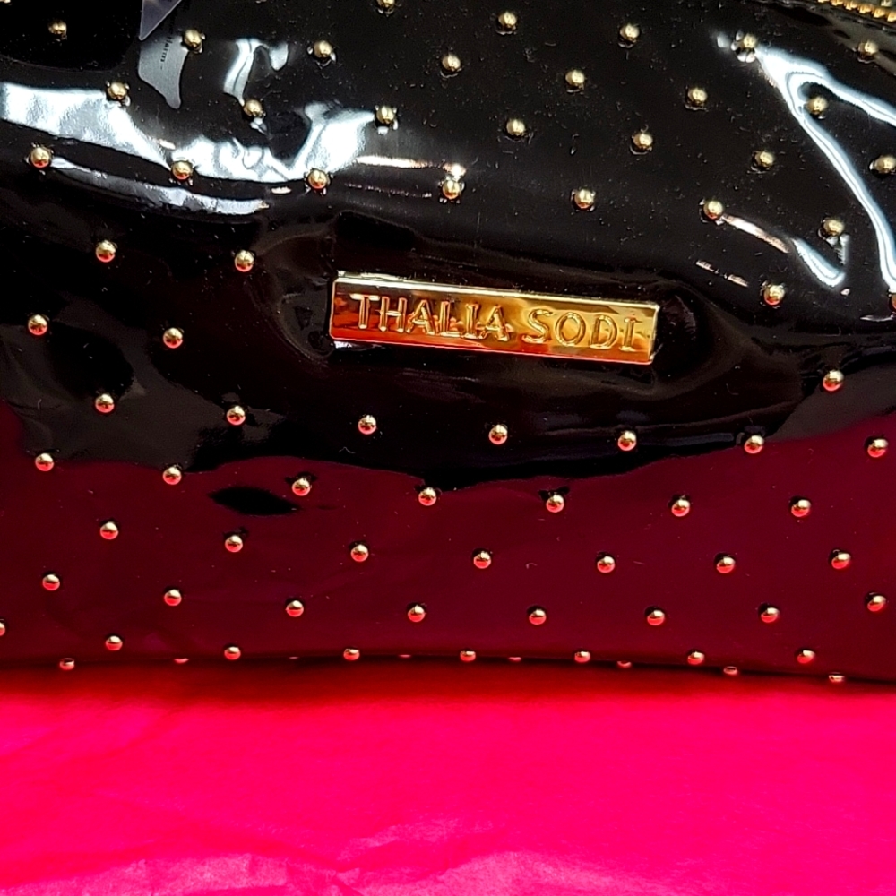 Black leather cosmetic bag. Great for travel or everyday use.